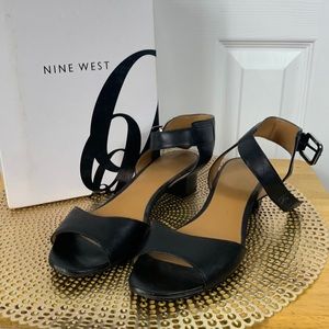 Nine West black ankle strap opened toed sandals size 8.5. Silver buckle.